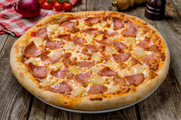 pizza Hawaiian with pineapple and chicken