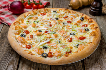 Pizza with salmon