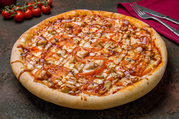 Pizza with meat and barbecue sauce
