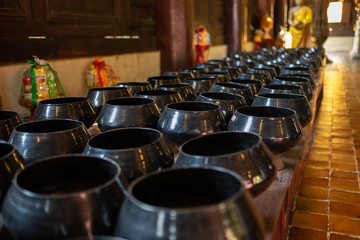 many alms bowl in the Thai temple