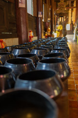 many alms bowl in the Thai temple