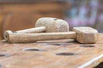 old wooden hammer in the factory
