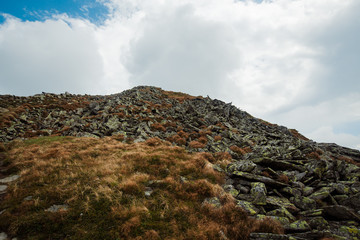 top of the mountain in the stones