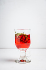 Hot raspberry beverage with rosemary. Selective focus. Shallow depth of field.