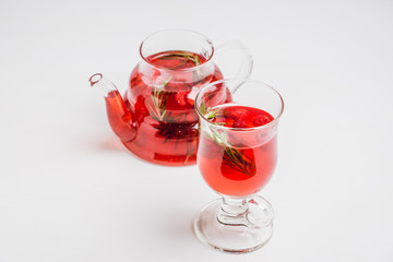 Hot raspberry beverage with rosemary. Selective focus. Shallow depth of field.