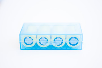 Yellow rechargeable batteries in the blue box