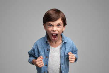 Angry boy screaming at camera - Powered by Adobe