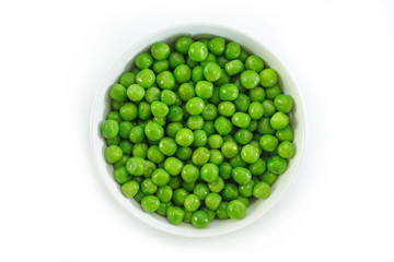 green peas on white bowl on white background.