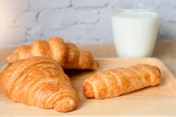 Croissants and milk on table.  Food for breakfast concept