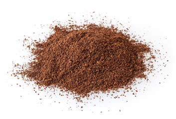 Heap of ground roasted coffee beans isolated on white background