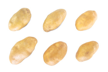 many potato top view on white background
