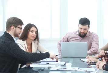 businessman holds a briefing with the business team