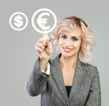 Businesswoman pointing on euro sign. Money transfers, exchange and banking concept
