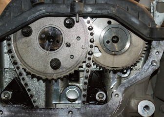 Chain of timing and two sprockets of camshafts. Fragment of the gas distribution system of the automobile engine.
