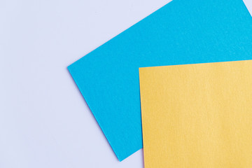 Mix of blue, yellow colors of design paper.