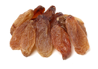 brown raisin stacked together on white background