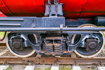 Detail of red fire train on the track.