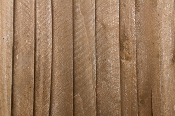 panel of wooden slats covered with wood stains under oak