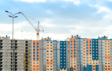 House under construction against the blue sky.