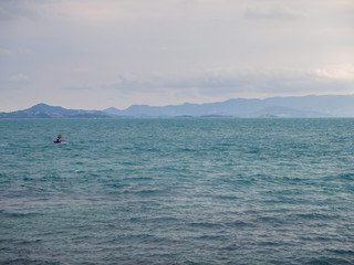 Motor boat on the surface of the sea near the island. Koh Phangan. Thailand