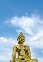 Gold color Statue in thai temple over blue sky