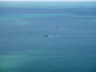 Motor boat on the surface of the sea near the island. Koh Phangan. Thailand