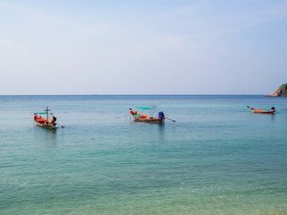 Motor boat on the surface of the sea near the island. Koh Phangan. Thailand