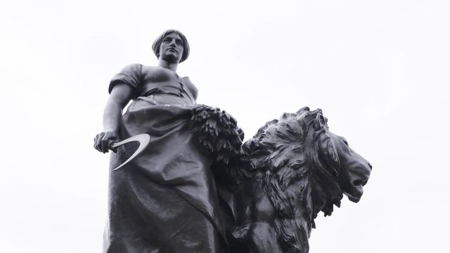 Goddess statue with lion next to her | SLOW MOTION