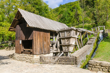 Fototapeta premium The water-powered saw mill in the Architectural And Ethnographic Complex Etar - at open-air museum near the city of Gabrovo