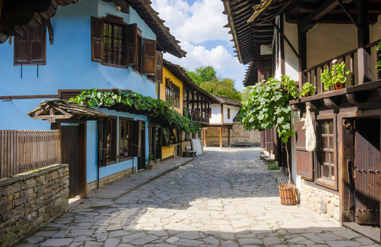 Historic houses along the street in the Architectural And Ethnographic Complex Etar - an open-air museum near the city of Gabrovo