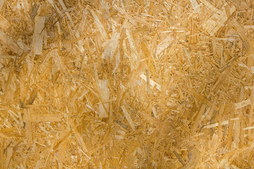 white yellow gray fiberboard closeup. rough wood surface texture