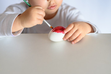 Colouring eggs for easter time at home.