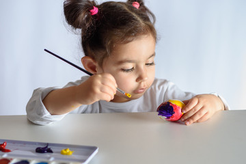 Colouring eggs for easter time at home.