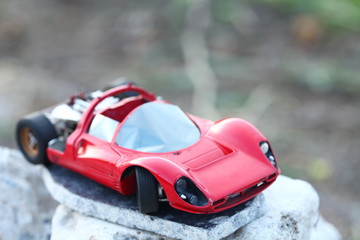 Fototapeta na wymiar Miniature model toy car scene.