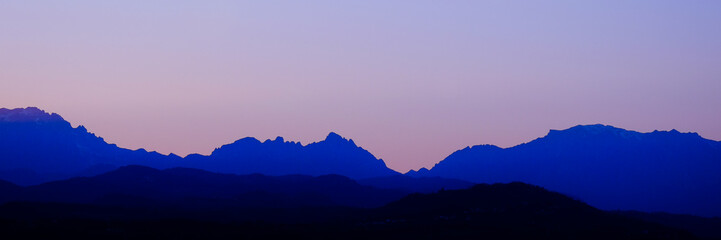 Skyline during the sunset of the Mountains Alps from Vicenza, April 2019
