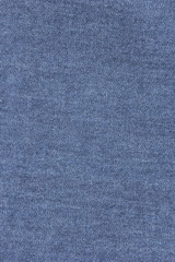 Fototapeta na wymiar Old blue denim jeans texture or background with visible fibers
