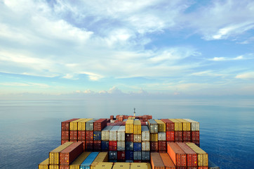 Loaded container ship sailing through the Indian Ocean.
