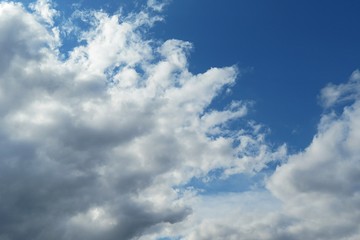 Fototapeta na wymiar Beautiful flame clouds in blue sky, natural background