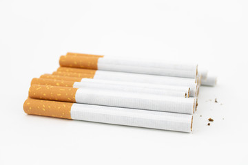 Several cigars on white background. Filtered cigarettes. Tobacco.
