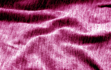 Fototapeta na wymiar Textile texture with blur effect in pink color.