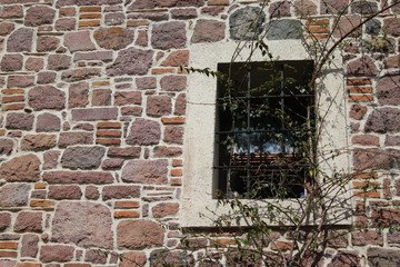 old brick wall with window