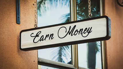 Obraz premium Street Sign Earn Money