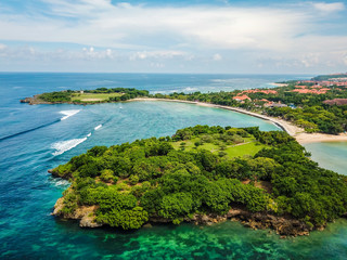 Drone image of Garden of Hope peninsula in Bali Indonesia taken above the Nusa Dua Beach during...