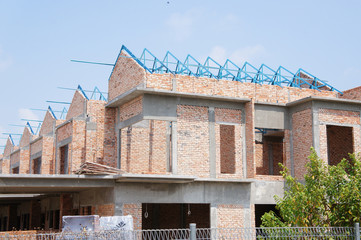 Double story luxury terrace house under construction in Malaysia.  Designed by architect with modern and contemporary style. Conventional construction method was used. 