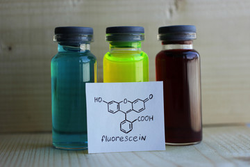 Fluorescent green dye fluorescein and its structural formula.
