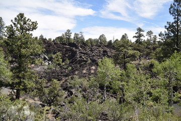 Flagstaff, AZ., U.S.A. June 5, 2018. Sunset Crater Volcano National Monument est. in 1930. Sunset Crater Volcano is a prime example of an 1,120-foot cinder volcano with substantial lava flows. 