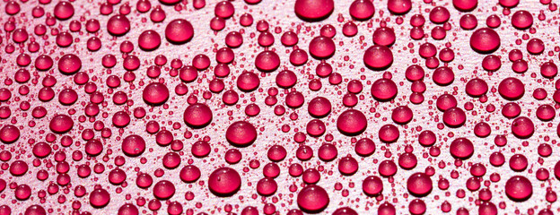 red water drops on red background