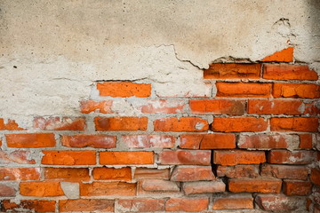 Old brick wall texture with cracks.