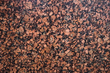 Marble textured spotted surface made like mosaic. Granite texture close-up.