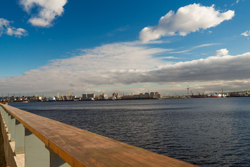 Fototapeta premium SAINT-PETERSBURG. RUSSIA - 04-13-2019: CULTURAL CENTER PORTSEVKABEL. VIEW ON THE RIVER BOLSHAYA NEVKA IN SUNNY DAY.